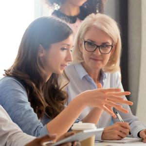 Women having discussion at desk